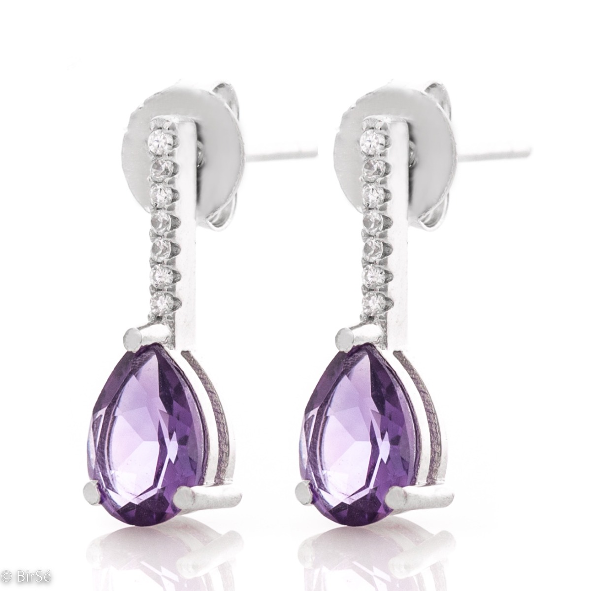 Add a delicate finish to your look with rhodium silver earrings and a fabulous purple amethyst, in the charming company of sparkling zircons.