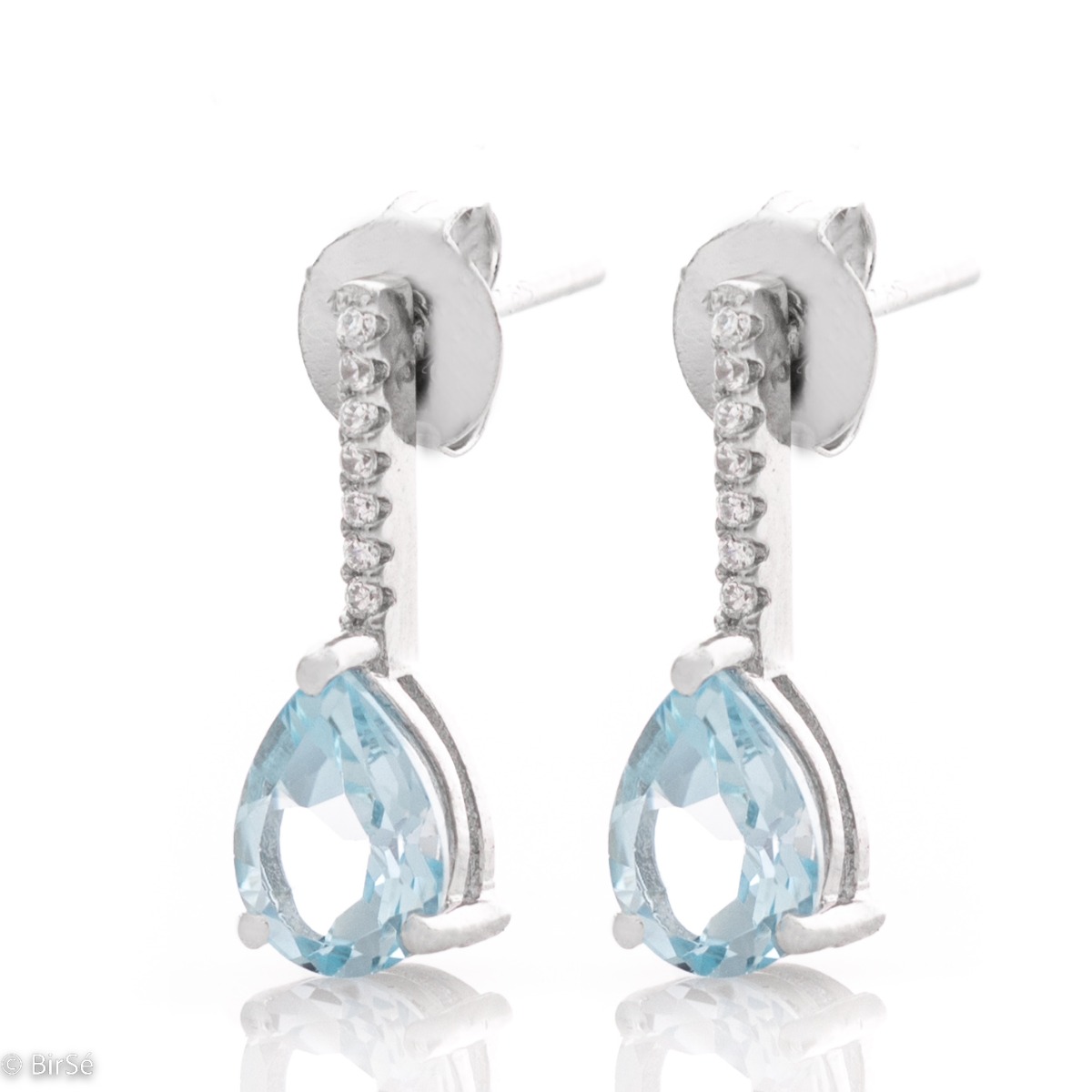 The beauty of azure blue in lovely sterling silver earrings with natural blue topaz and enchanting zircons.