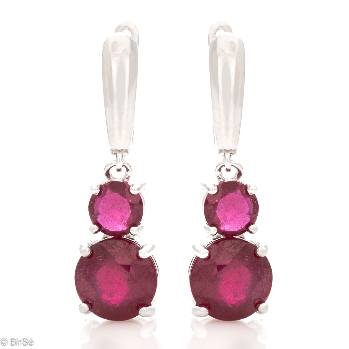 Elegant royal natural ruby ​​dangle earrings in various shapes and sizes complemented with exquisite rhodium silver craftsmanship. The clasp is English type, comfortable and secure.