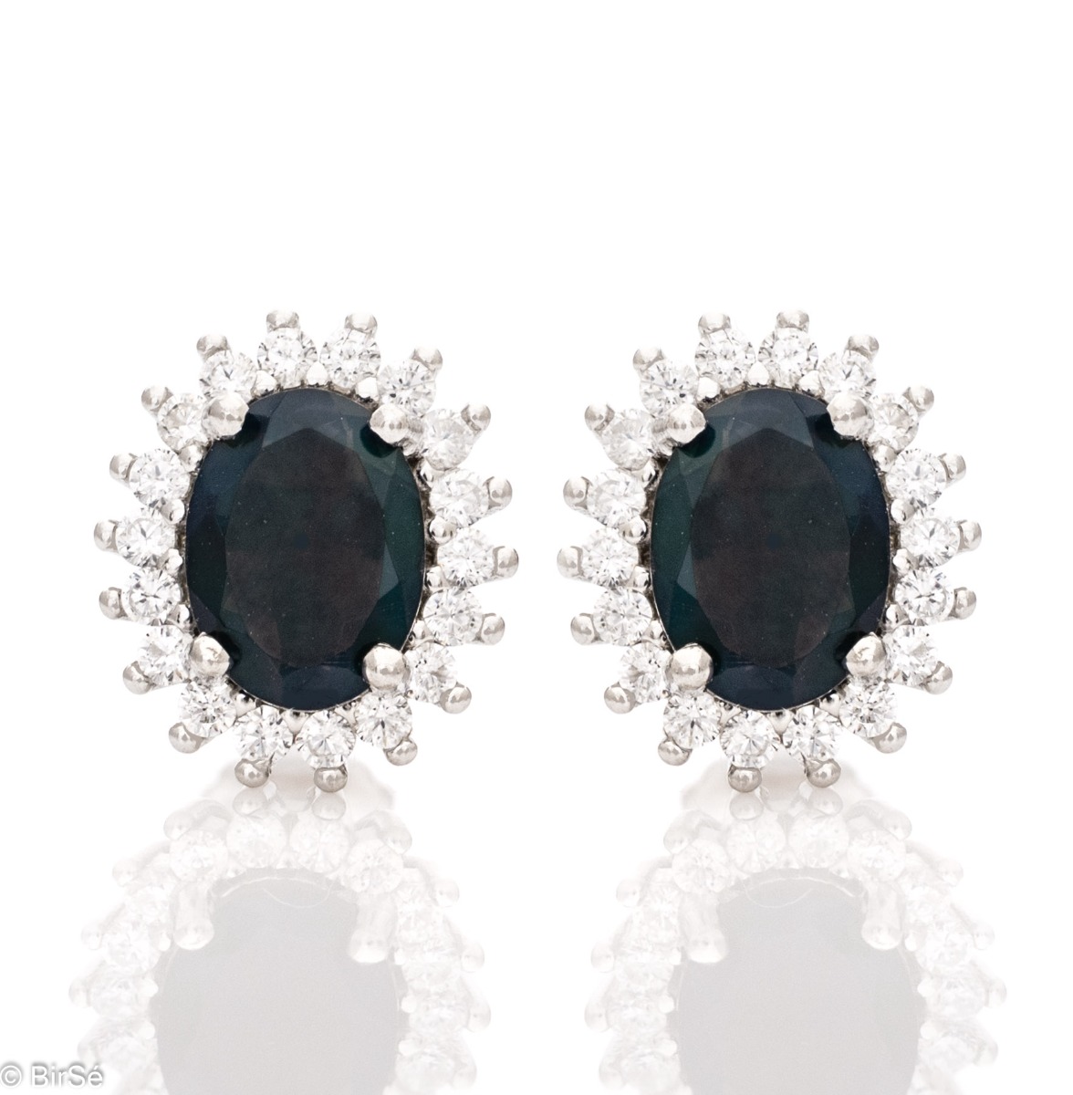 Elegant women's earrings on a pin with a spectacular rhodium-plated silver construction, combined with a magnetic black opal stone, surrounded by sparkling zircons.