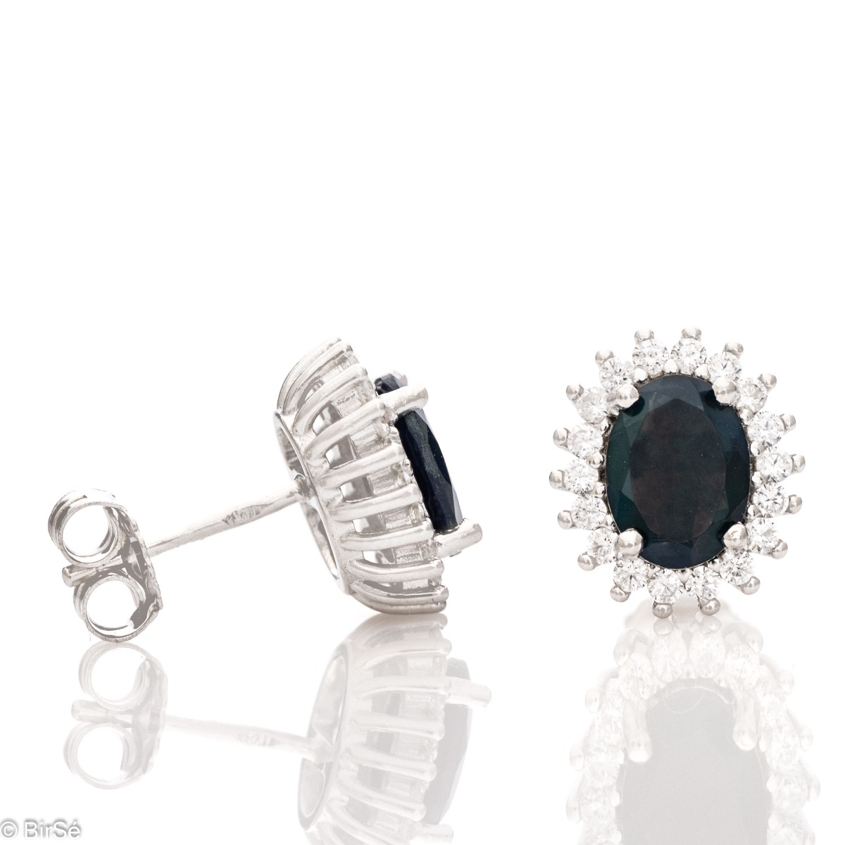 Elegant women's earrings on a pin with a spectacular rhodium-plated silver construction, combined with a magnetic black opal stone, surrounded by sparkling zircons.