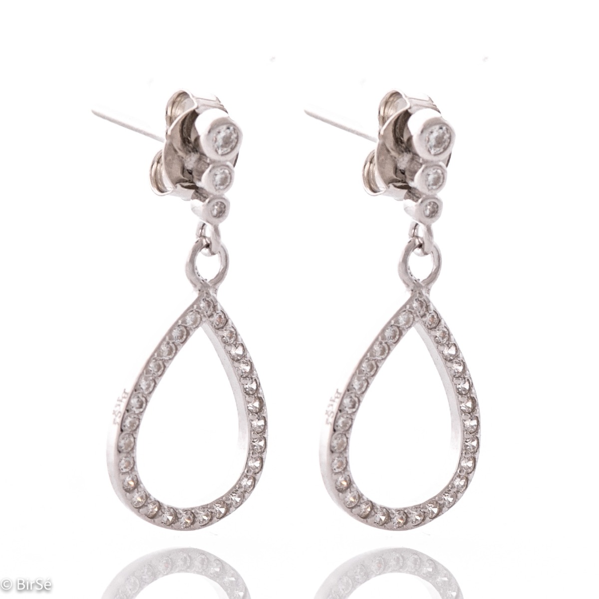 A drop of mood - amazing silver earrings with a spectacular look and a pin fastening. Stylish designer craftsmanship of the compositional elements from a fine combination of rhodium silver with delicate sparkling zircons.