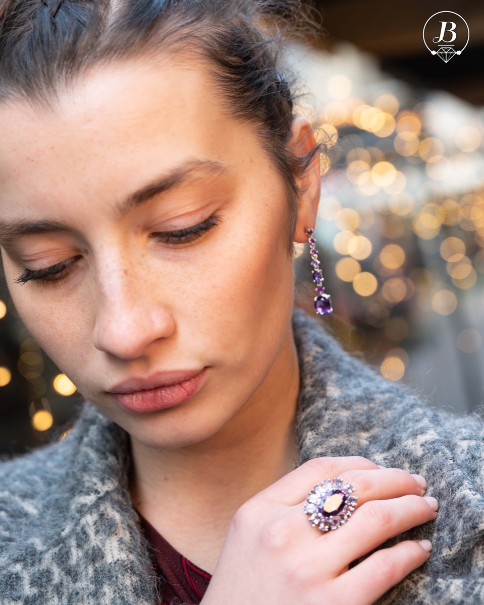 A delicate beautiful flower of natural sparkling amethysts and rhodium silver. The unique ring is suitable for ladies who prefer large jewelry. It can be combined with suitable earrings and a pendant.