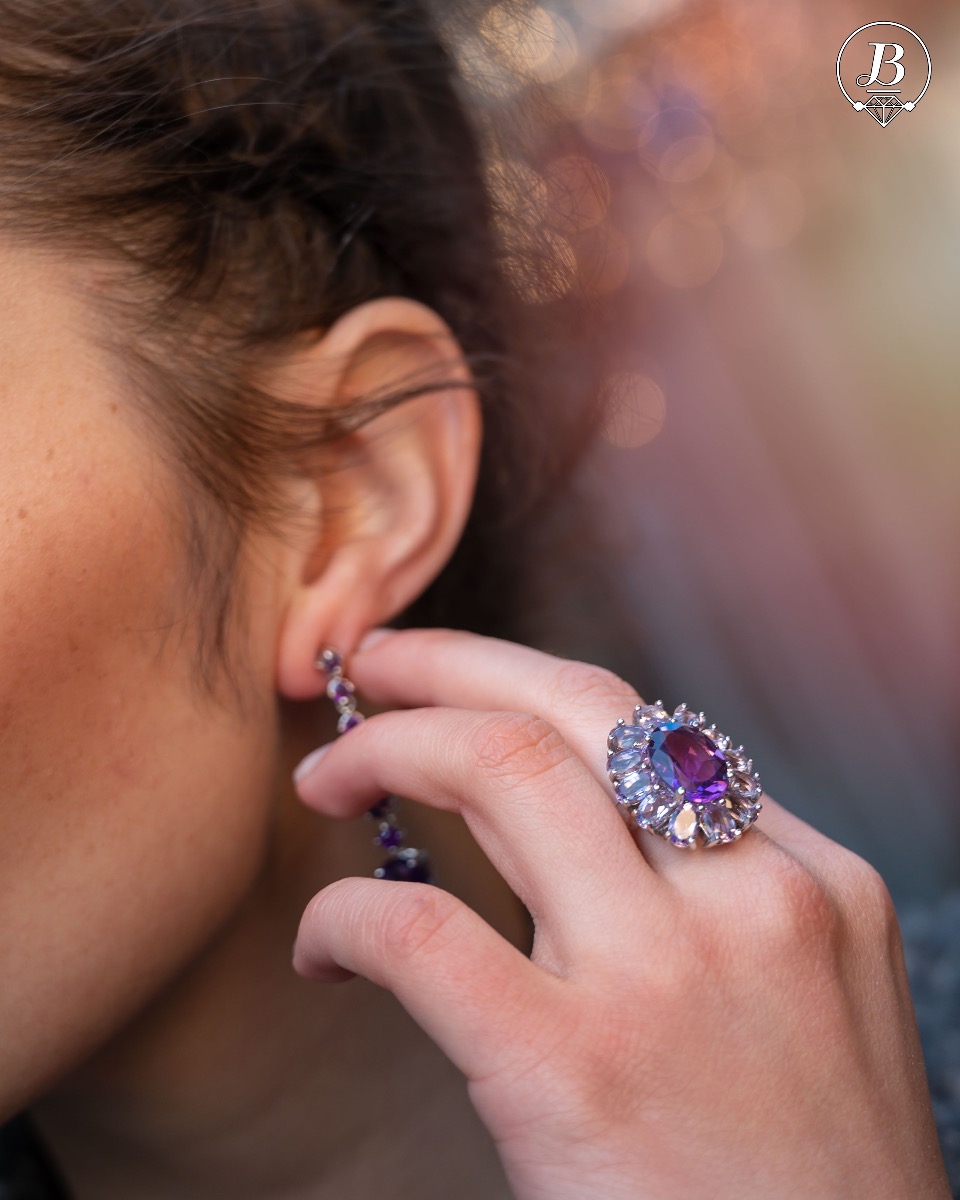 A delicate beautiful flower of natural sparkling amethysts and rhodium silver. The unique ring is suitable for ladies who prefer large jewelry. It can be combined with suitable earrings and a pendant.