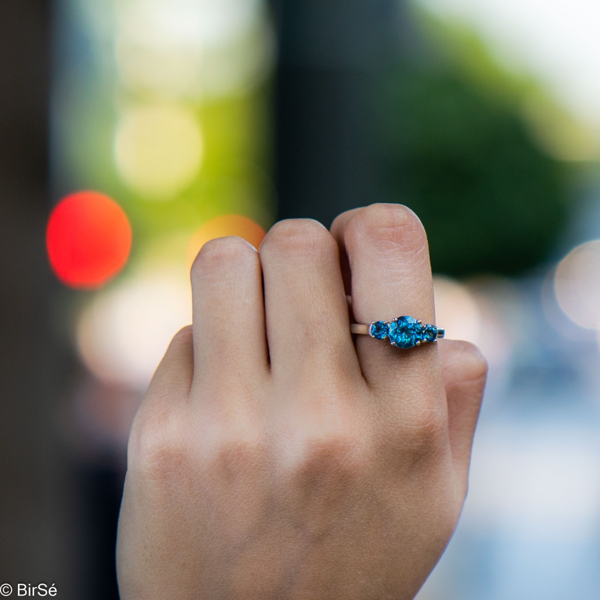 Silver Solitaire Ring with Natural London topaz