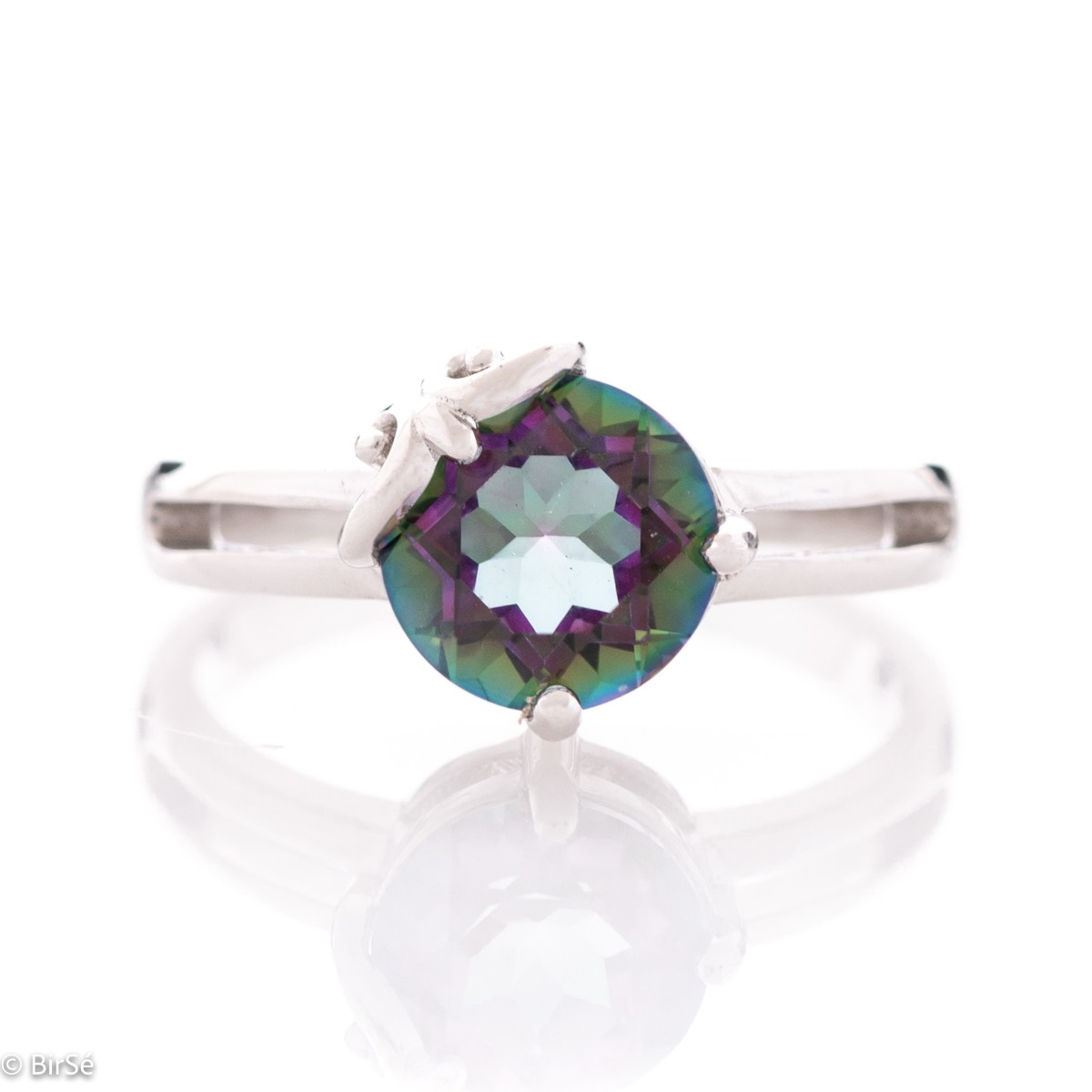 A spectacular women's ring with delicate detailing, combining a multi-colored and radiant natural stone, mystic topaz, with beautiful rhodium-plated silver.