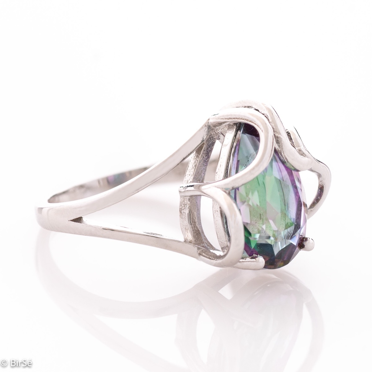 A unique women's ring made of exquisite rhodium-plated silver with gentle curves, intertwining the glow of a natural mystic topaz stone in a beautiful teardrop shape.