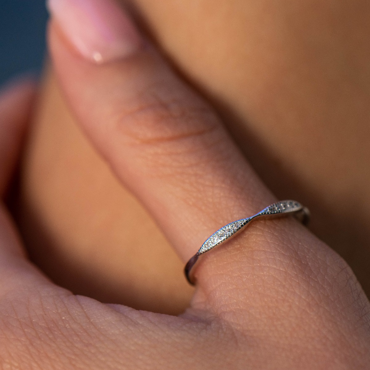 Stylish and elegant women's ring with a scorchingly delicate look. Extremely delicate craftsmanship from a fine combination of refined rhodium silver with sparkling zircon stones.