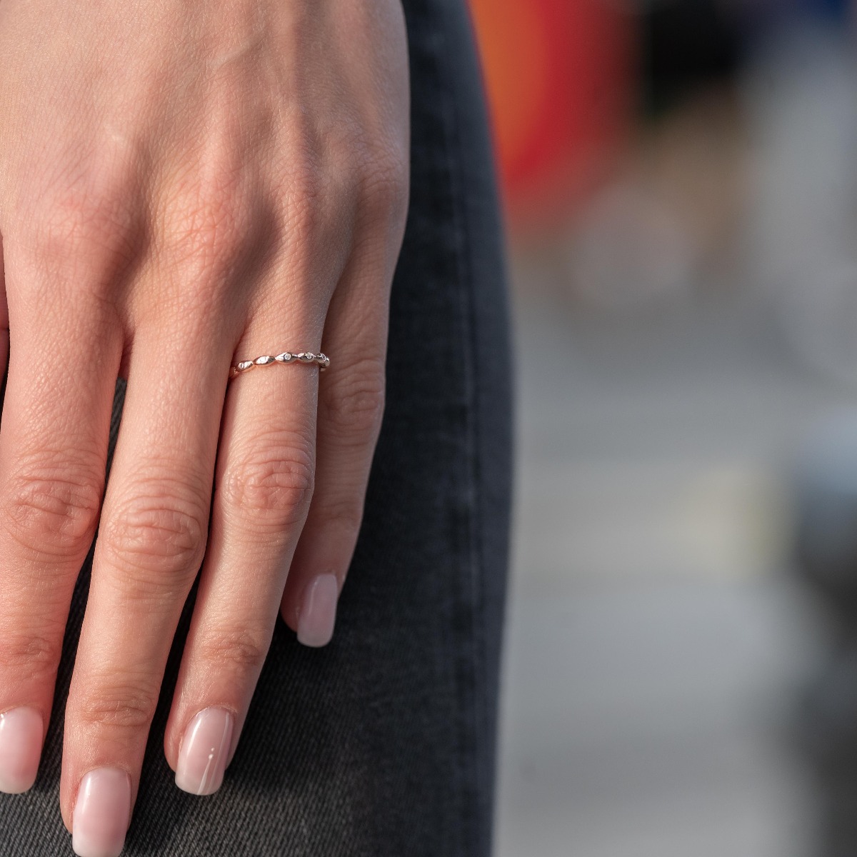 Silver ring with delicate curves of rose silver. Sparkling zircons bring a fresh breath of ethereal elegance.