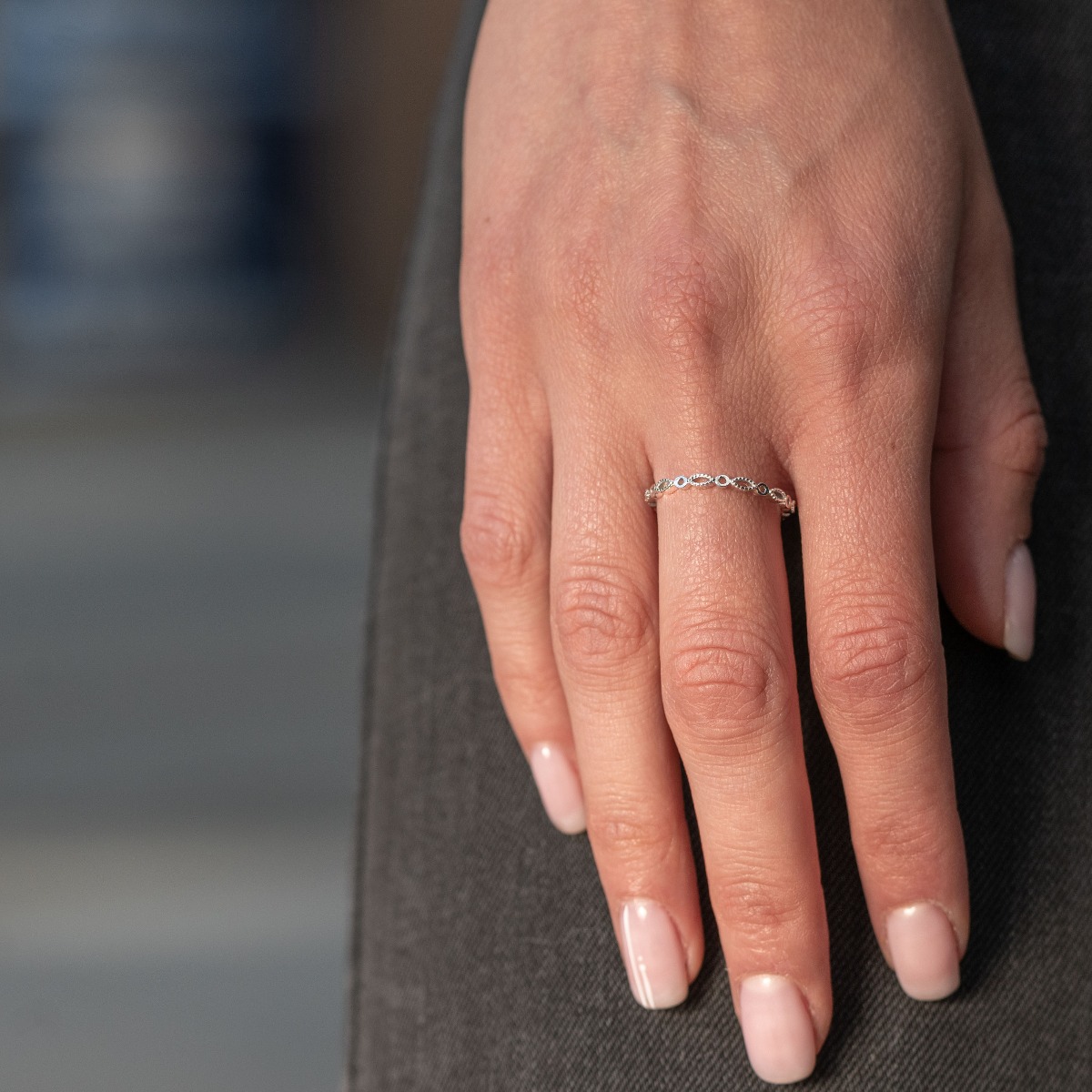 A delicate ladies' ring made entirely of rhodium-plated silver. Thanks to its stylish and slim shape, it is suitable to match with another ring next to it.