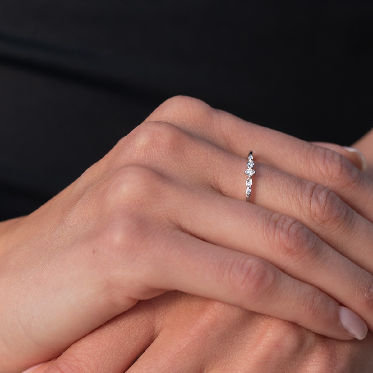 An elegant ring crafted from rhodium-plated sterling silver with added fine cubic zirconias for a delicate shine - a perfect gift that shows personal attention and sophistication.