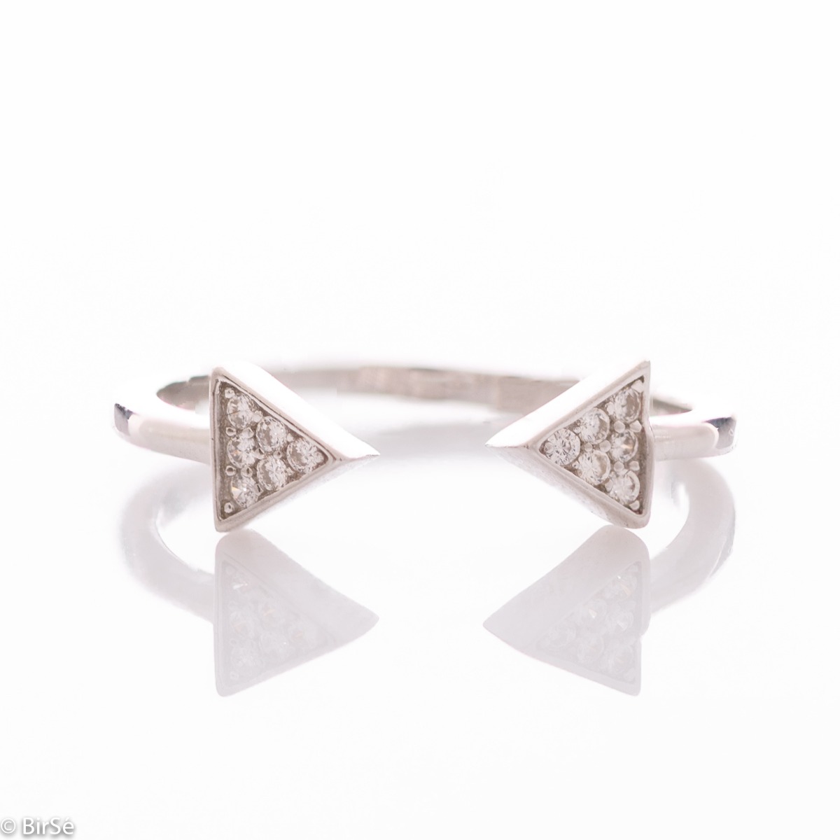 A spectacular open model silver ring, the ends of which are in the form of arrows, elegantly decorated with several zircons. This type of ring allows for one, two number size changes. All jewelry is gift-wrapped and accompanied by a certificate of quality