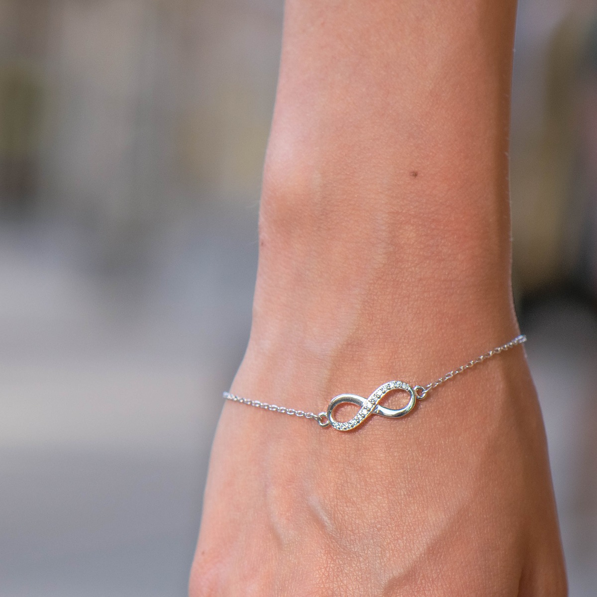 Ethereal women's jewelry made of soft silver with exquisite workmanship. The fine women's bracelet has a beautiful infinity, decorated with captivating zircons. The bracelet has an extension, for more convenience when adjusting the length.