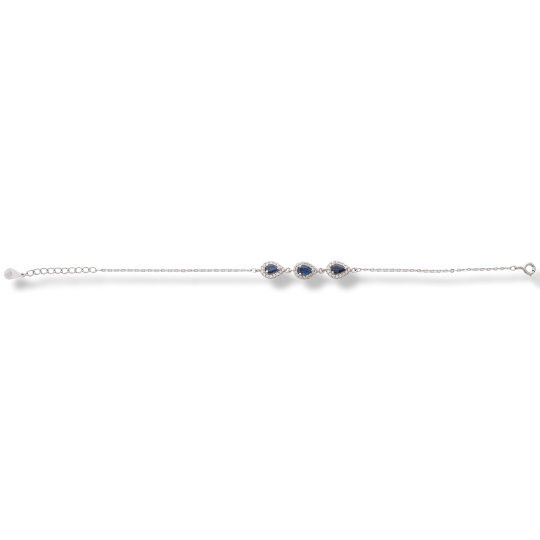 Elegant women's bracelet in soft silver with natural sapphire drops, decorated with exquisite and subtle elements and sparkling zircons. The bracelet has an extension, for greater convenience when adjusting the length.