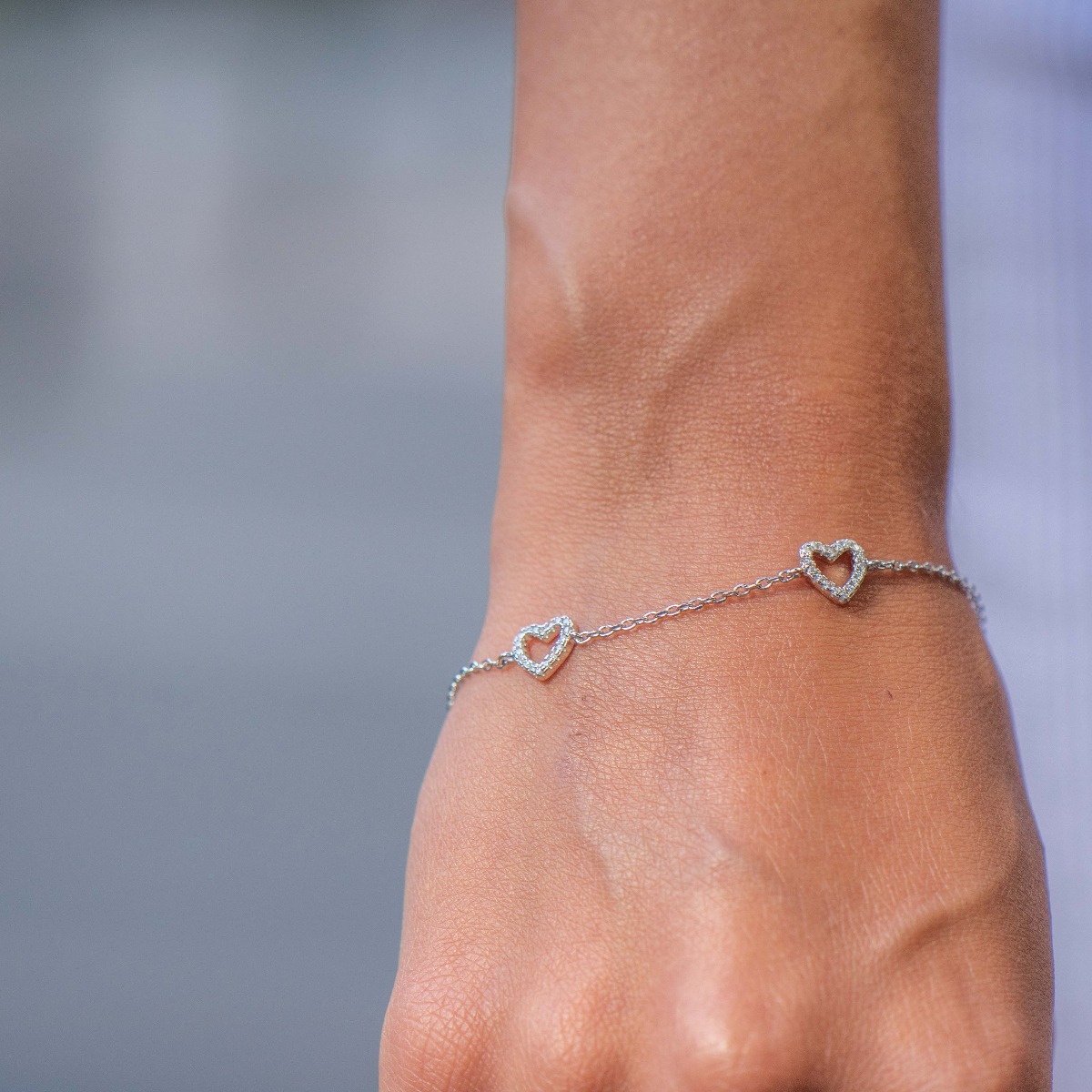 A charming women's bracelet in soft silver with an exquisite design of three hearts encrusted with sparkling zircons. The bracelet has an extension, for more convenience when adjusting the length. A new offer from BirSe for your special moments.