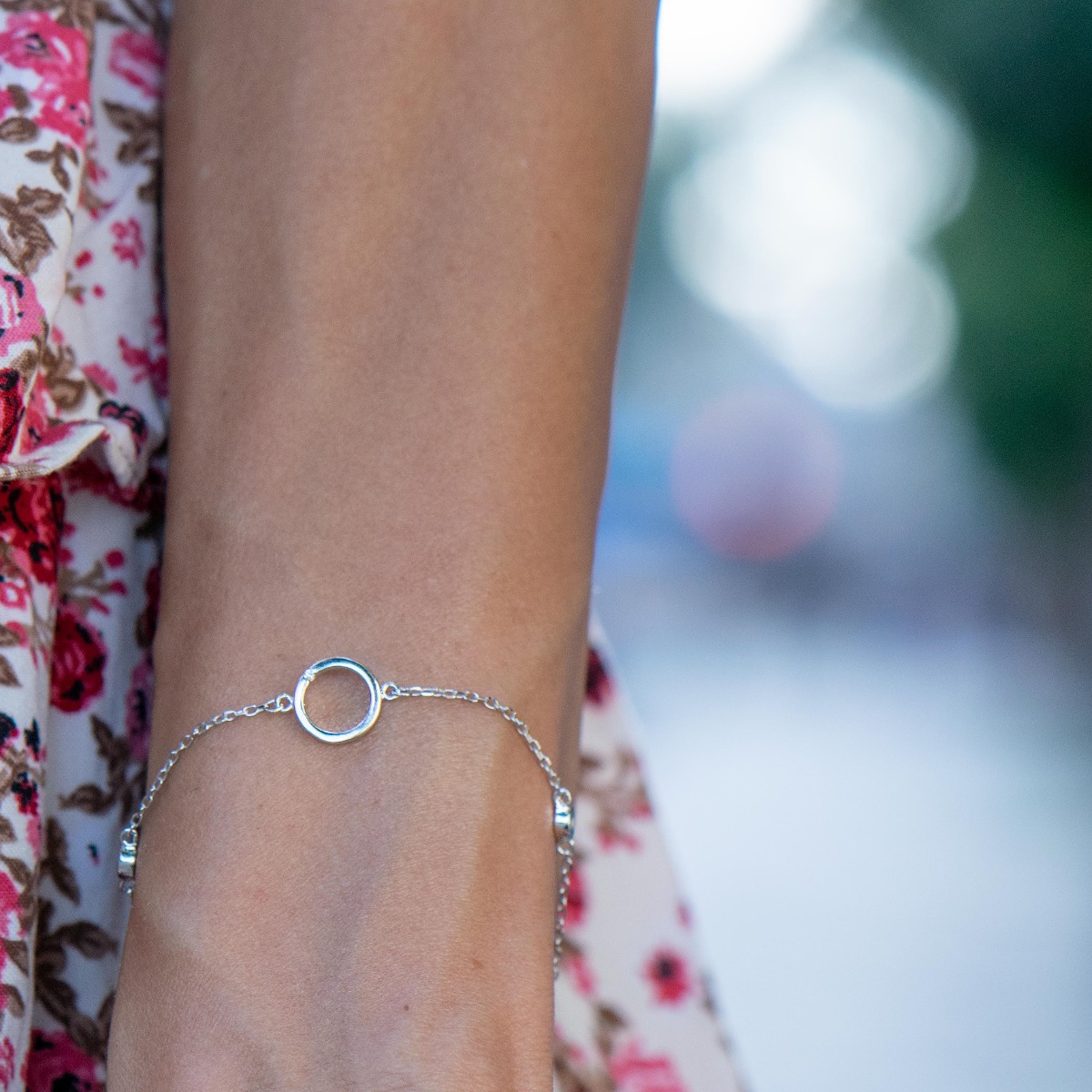 Elegant women's bracelet made of soft silver with exquisite workmanship, decorated with fine elements and sparkling zircons. The bracelet has an extension, for greater convenience when adjusting the length.