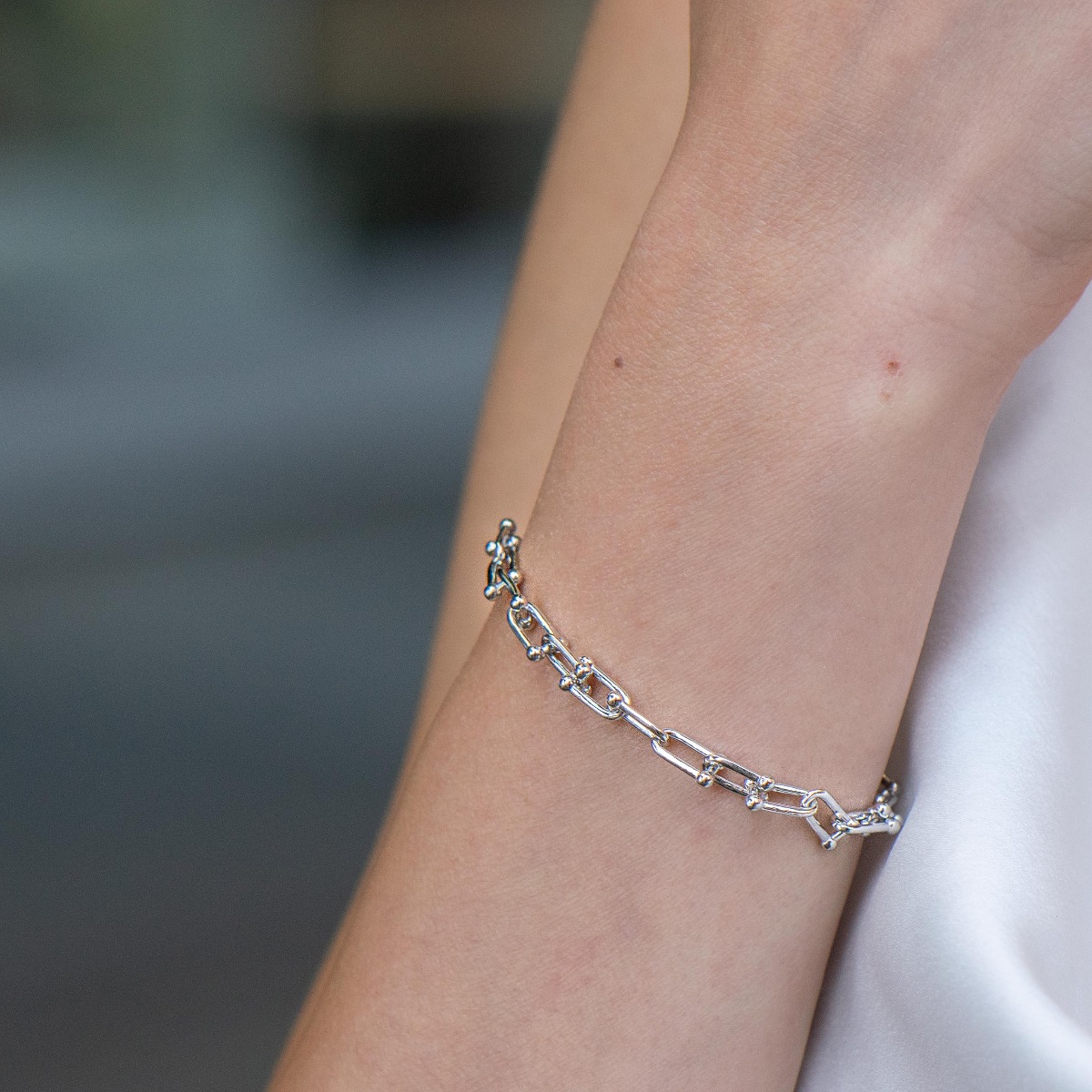 BirSe's new rhodium silver bracelet is interesting. The charming jewelry has a non-standard design of the elements and is suitable for ladies who prefer heavier jewelry.