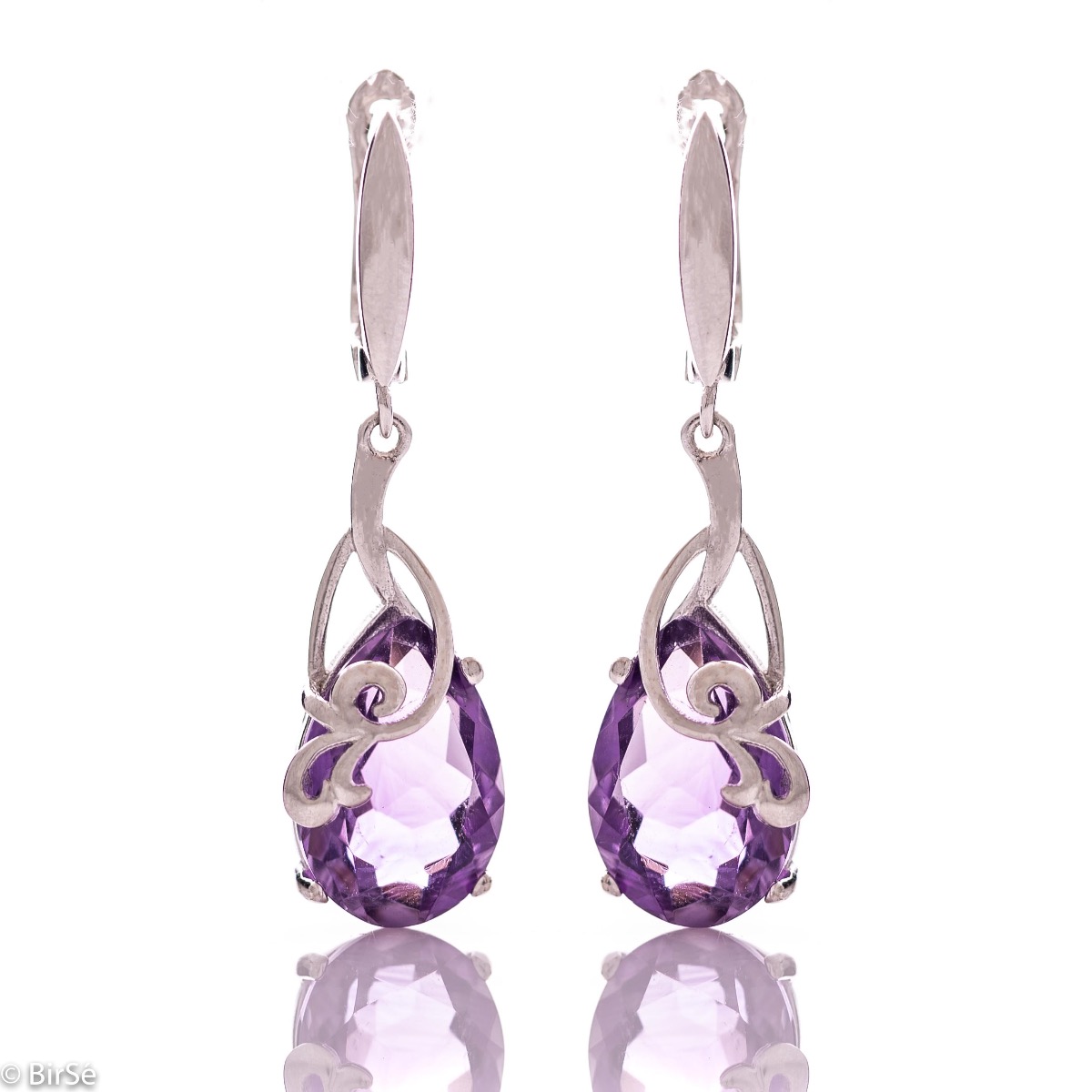 Exclusive pendant earrings with English clasp and exquisite workmanship combining radiant natural amethyst in a delicate teardrop shape with shiny rhodium silver. Can be combined with pendant and ring of the same model.