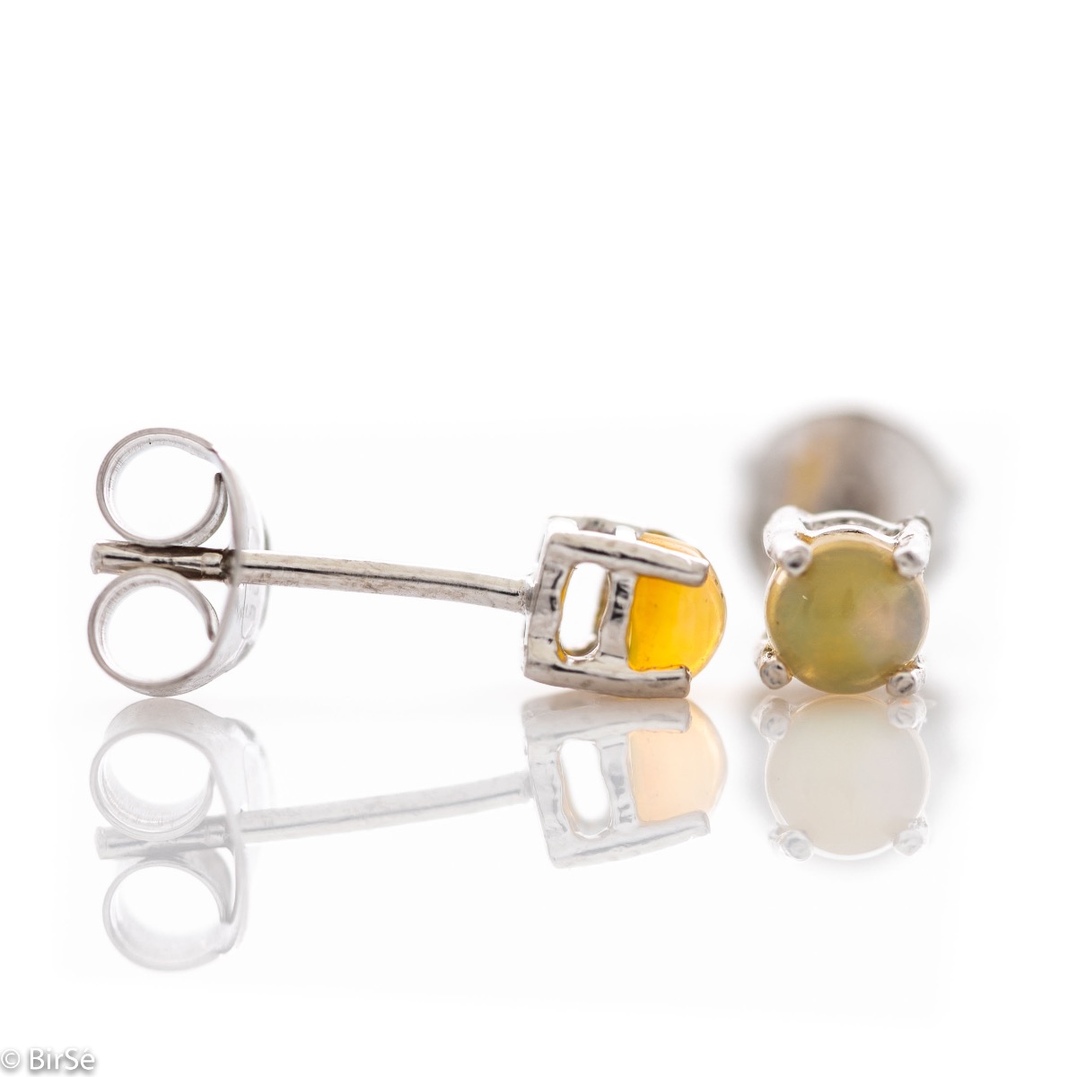 Delicate stud earrings with precision craftsmanship in beautiful rhodium silver, complemented by a fine and multi-colored natural opal stone. Also suitable for children.