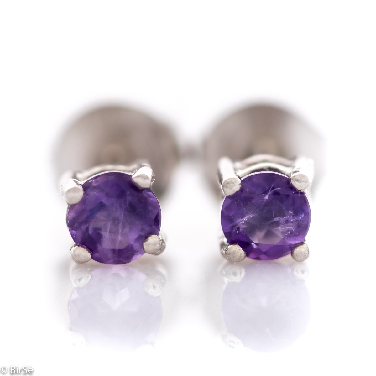 Delicate and delicate stud earrings suitable for both ladies and children, precision crafted from beautifully rhodium-plated sterling silver, complemented by radiant natural amethyst.