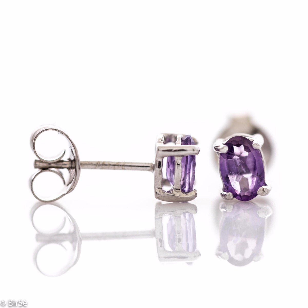 The gentle glow of a beautiful natural amethyst stone combined with fine craftsmanship in all rhodium silver, in our new women's stud earrings.