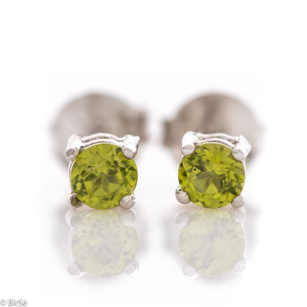 Fine sterling silver stud earrings with a natural glow of natural peridot stone and precision craftsmanship, suitable for both ladies and children.