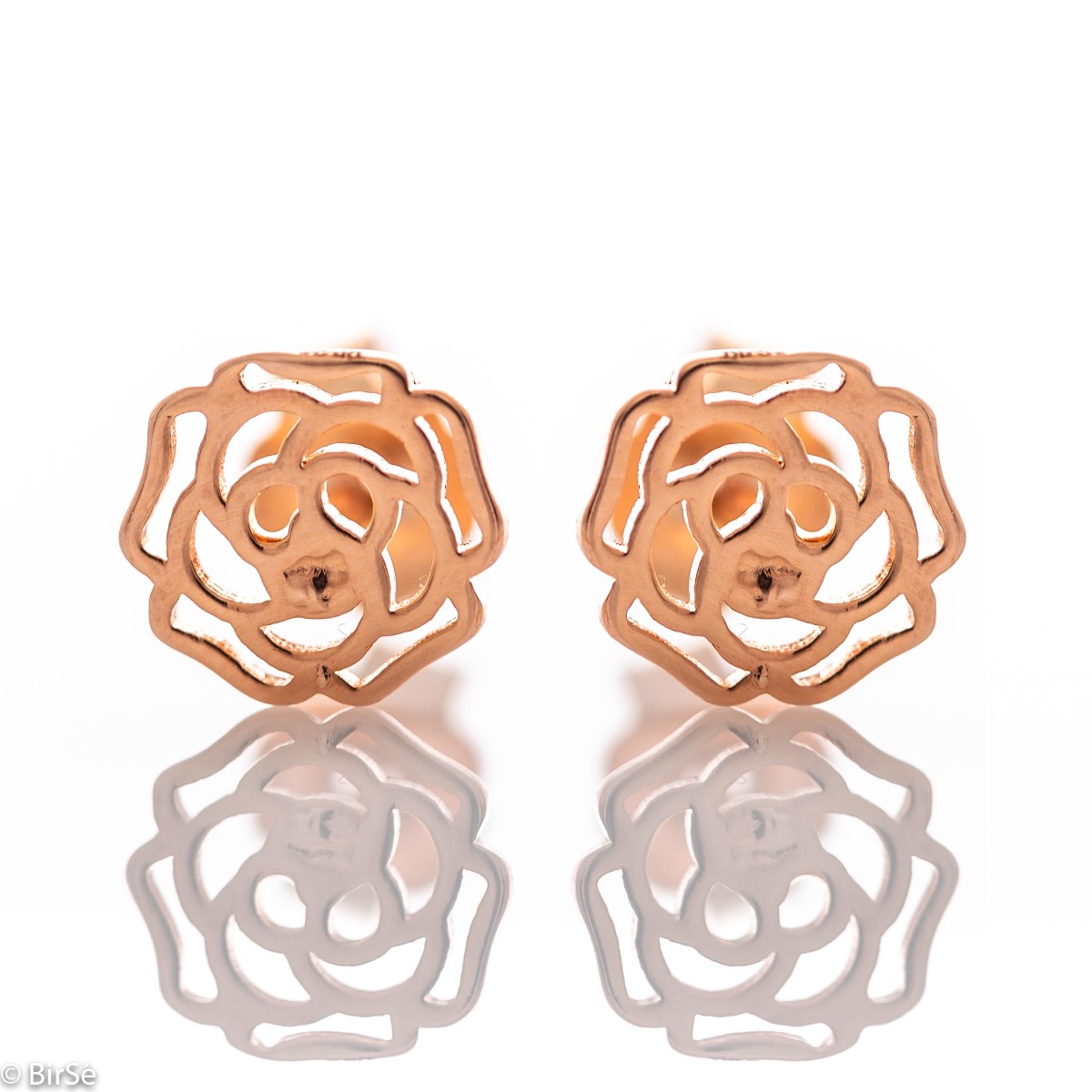 Delicate women's stud earrings with an exquisite shape of a beautiful rose, made entirely of shiny rhodium-plated rose silver. They can be combined with a pendant of the same model.