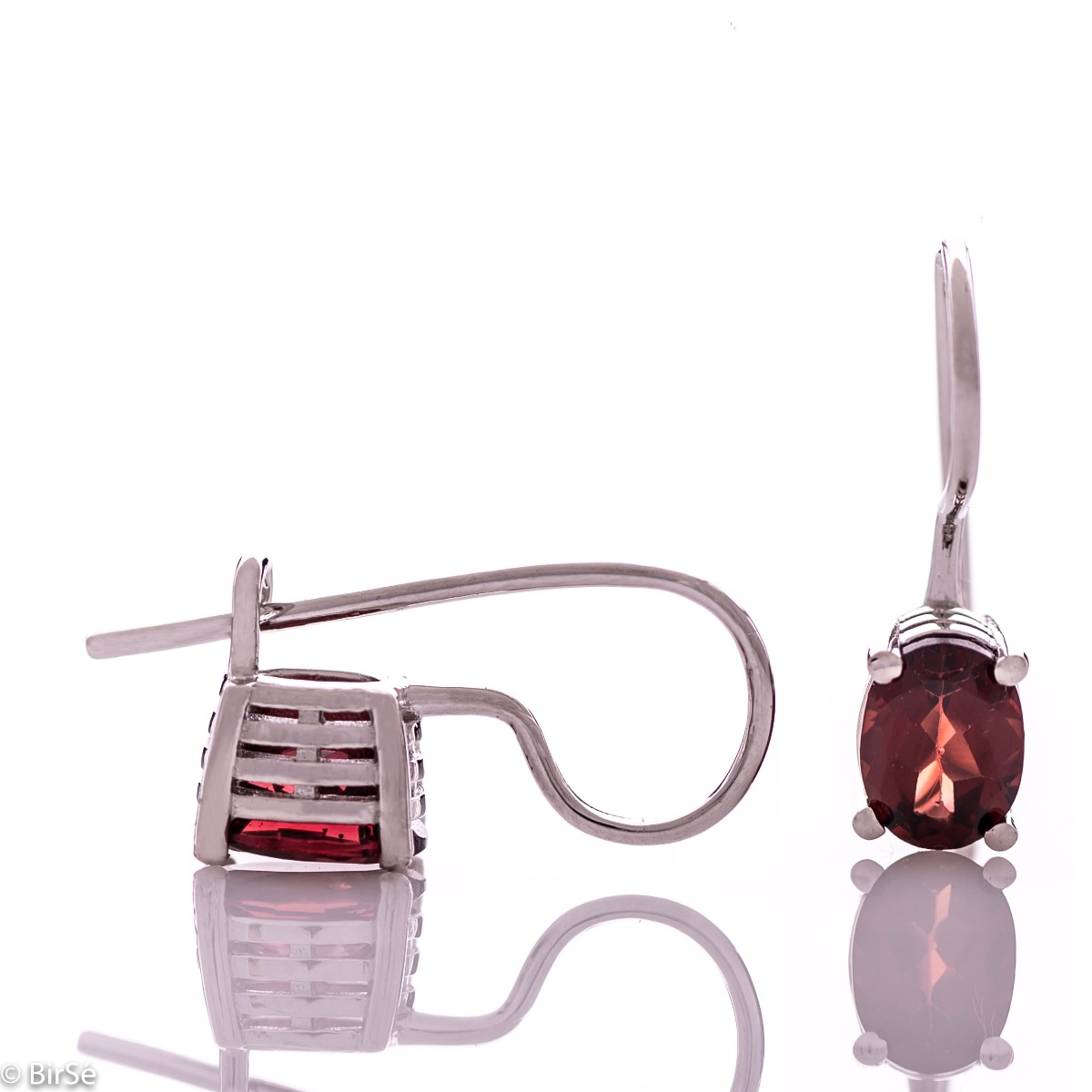 Delicate women's earrings with a clean and precise design combining shiny rhodium silver with radiant natural garnet.