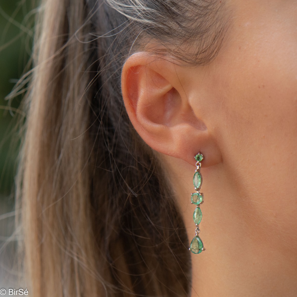 Make a choice that will be in your jewelry box for a long time! Treat yourself to the beauty of rhodium-plated sterling silver and natural emerald in gorgeous drop stud earrings.