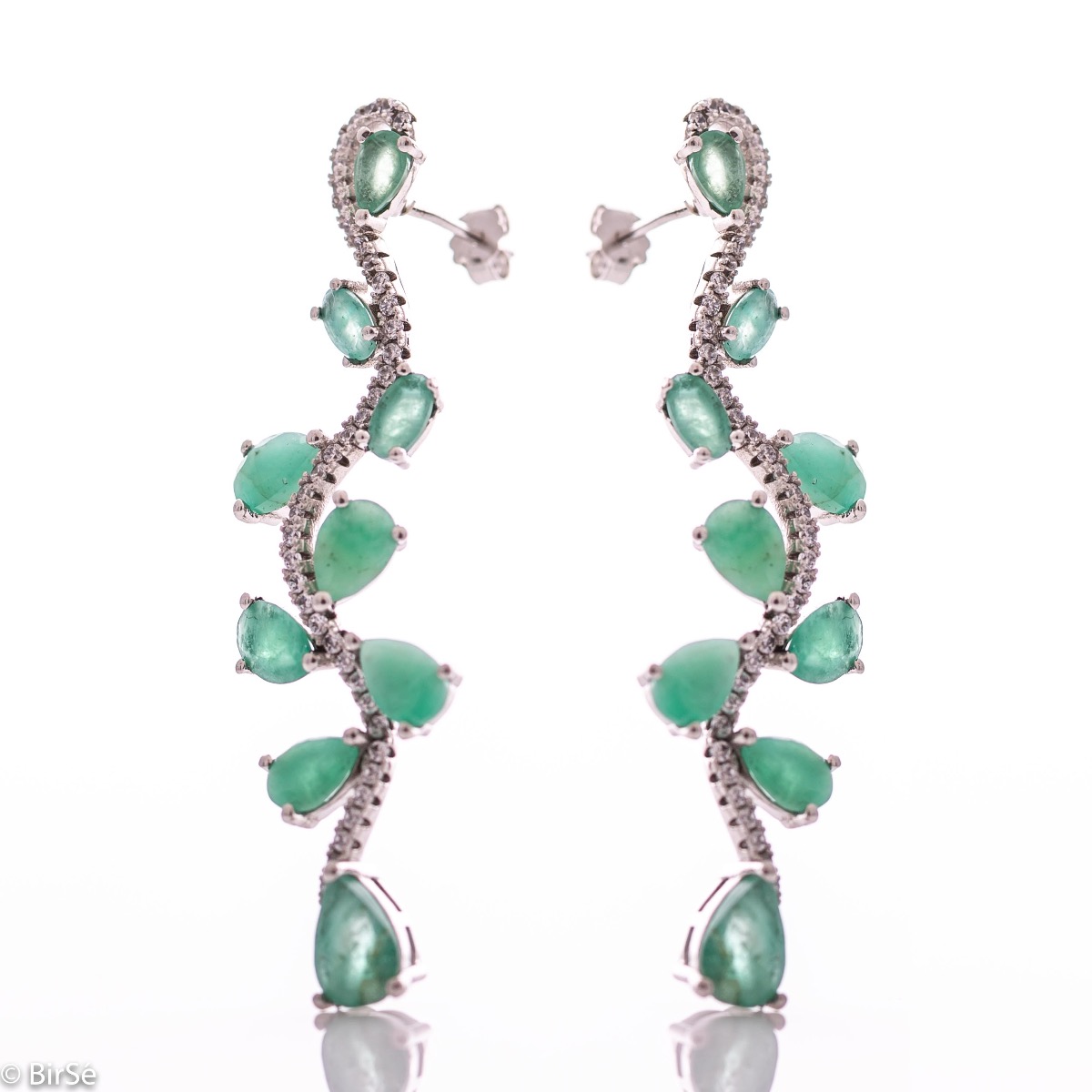 Dangling women's stud earrings with exquisite workmanship combining delicate rhodium silver with numerous natural emerald stones and sparkling zircons.