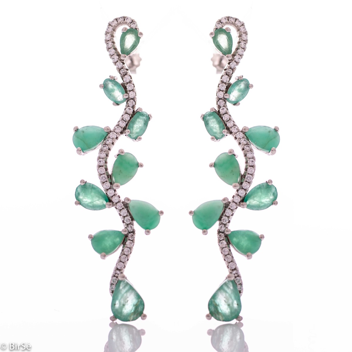 Dangling women's stud earrings with exquisite workmanship combining delicate rhodium silver with numerous natural emerald stones and sparkling zircons.