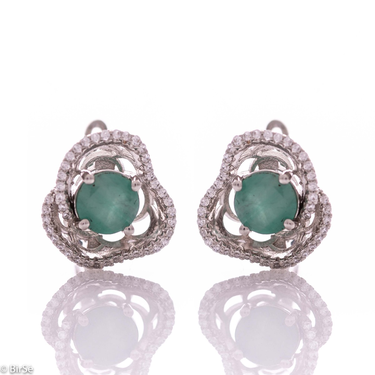 Elegant women's earrings with English clasp and exquisite workmanship entirely of rhodium-plated silver complemented by the glow of natural emerald and sparkling zircons. They can be combined with a ring and pendant of the same model.