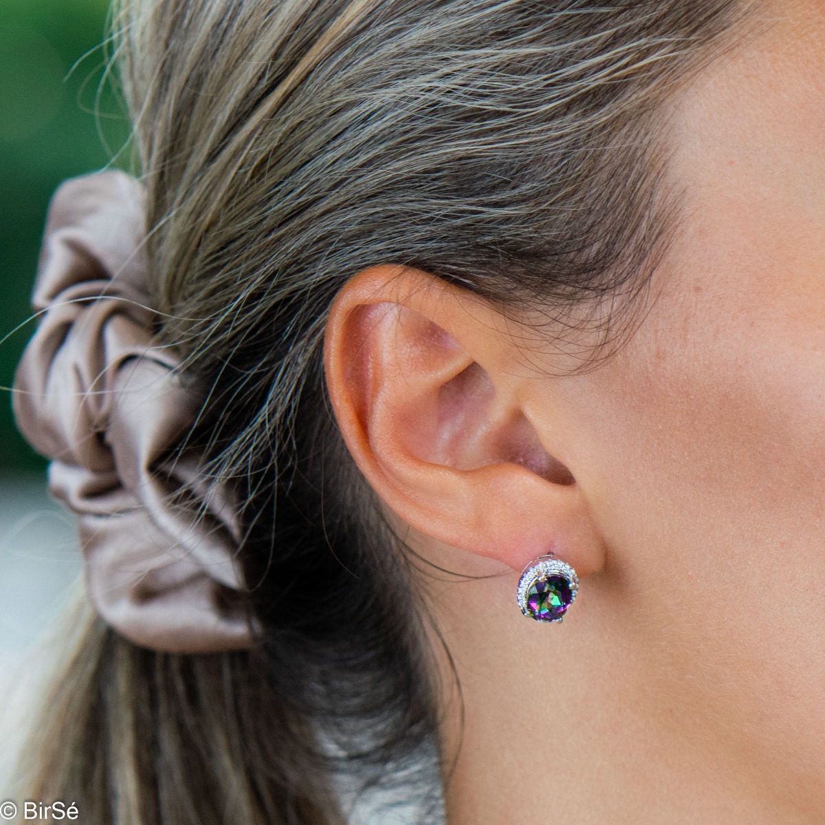 Elegant ladies earrings with English clasp and stylish design. Crafted entirely from soft rhodium-plated sterling silver, paired with a charming natural stone, mystic topaz, and sparkling zircons.