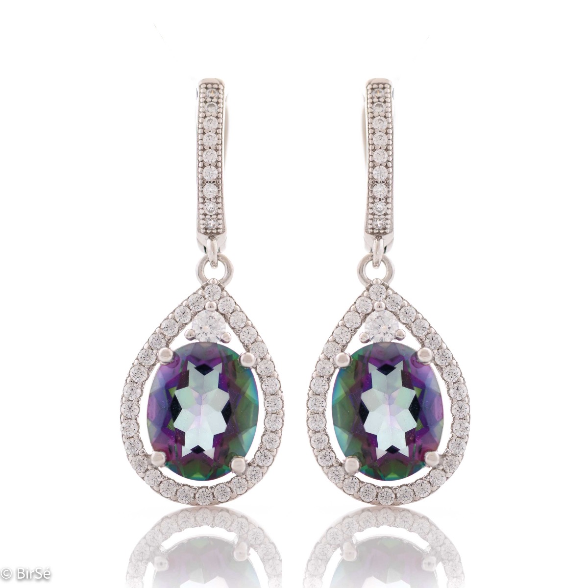 A spectacular and radiant natural mystic topaz stone, surrounded by sparkling zircons and exquisitely crafted in rhodium silver - these are our new English clasp earrings.