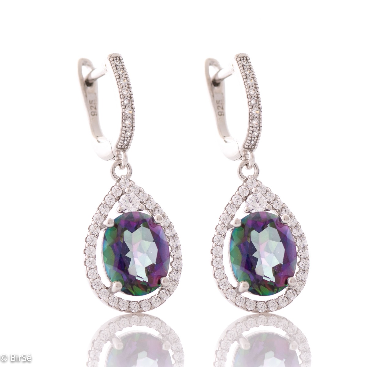 A spectacular and radiant natural mystic topaz stone, surrounded by sparkling zircons and exquisitely crafted in rhodium silver - these are our new English clasp earrings.