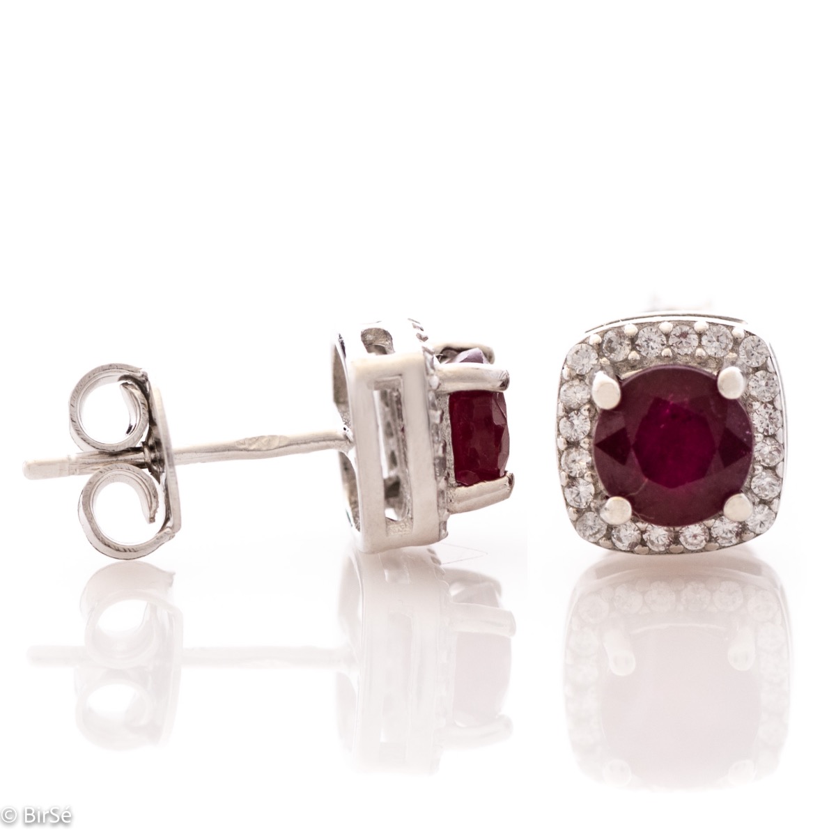 Unique and radiant women's stud earrings with delicate workmanship entirely of rhodium-plated silver and a spectacular shape of a small square of natural ruby ​​and sparkling zircons. Part of an exclusive ring and pendant set.