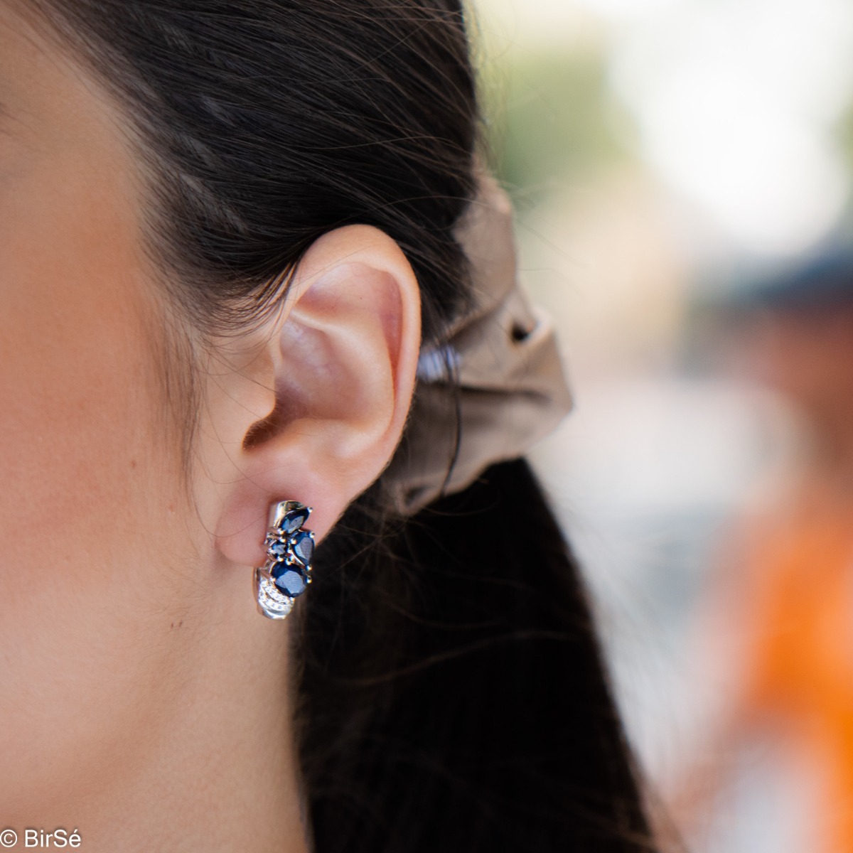 As charming as the dark night, the rhodium silver earrings, perfect natural sapphires and sparkling zircons will make your face shine with beauty. And why not match them with a ring and pendant from the same collection?