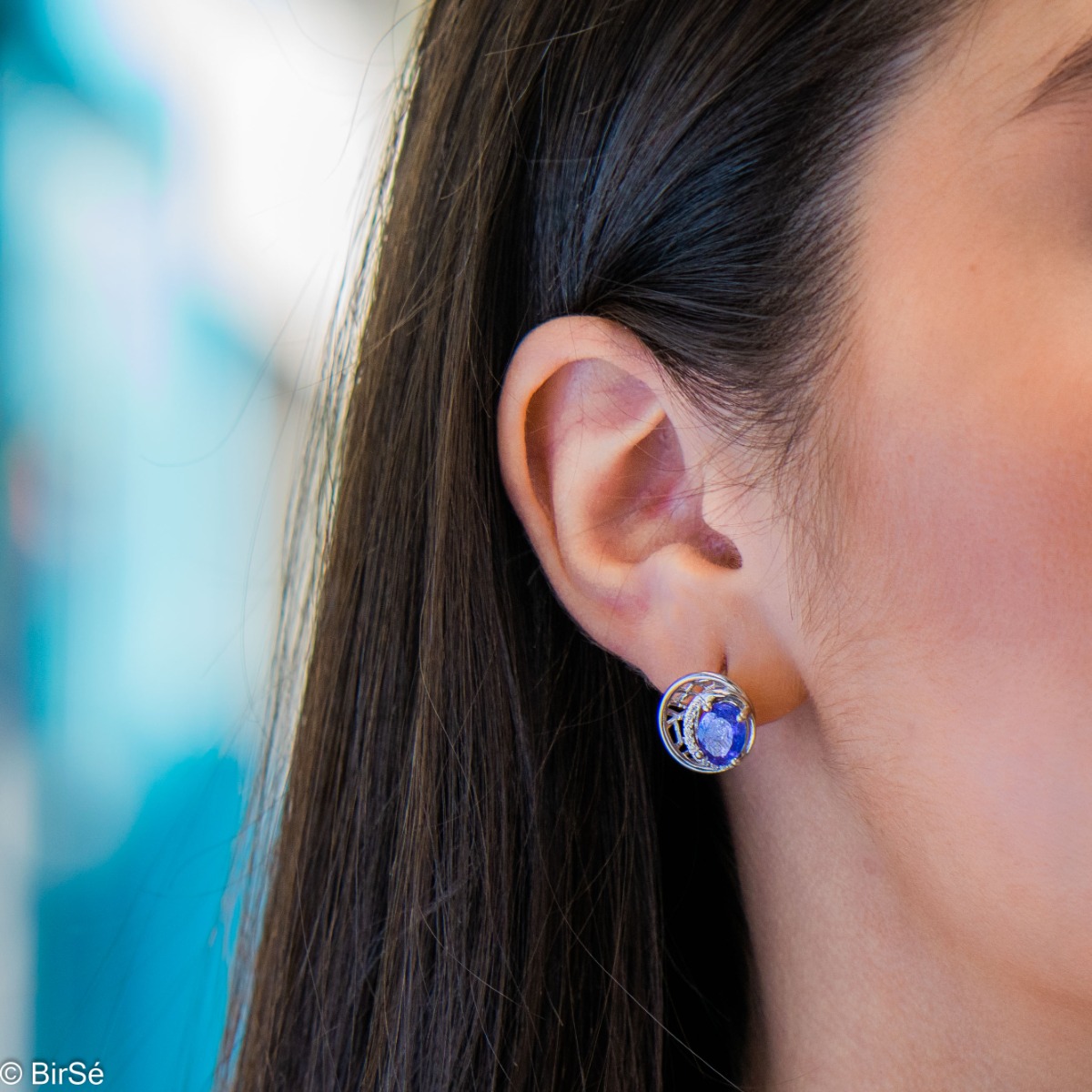 Elegant silver earrings with a modern look and English clasp. Stylish designer craftsmanship from a fine combination of rhodium-plated silver with captivating natural tanzanite. Complete with silver pendant and silver ring from the same collection.