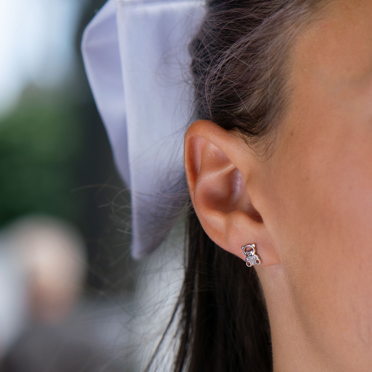 Charming earrings in soft rhodium silver in the shape of bears, encrusted with zircons. Pin fastening is comfortable and secure for little and big ladies.