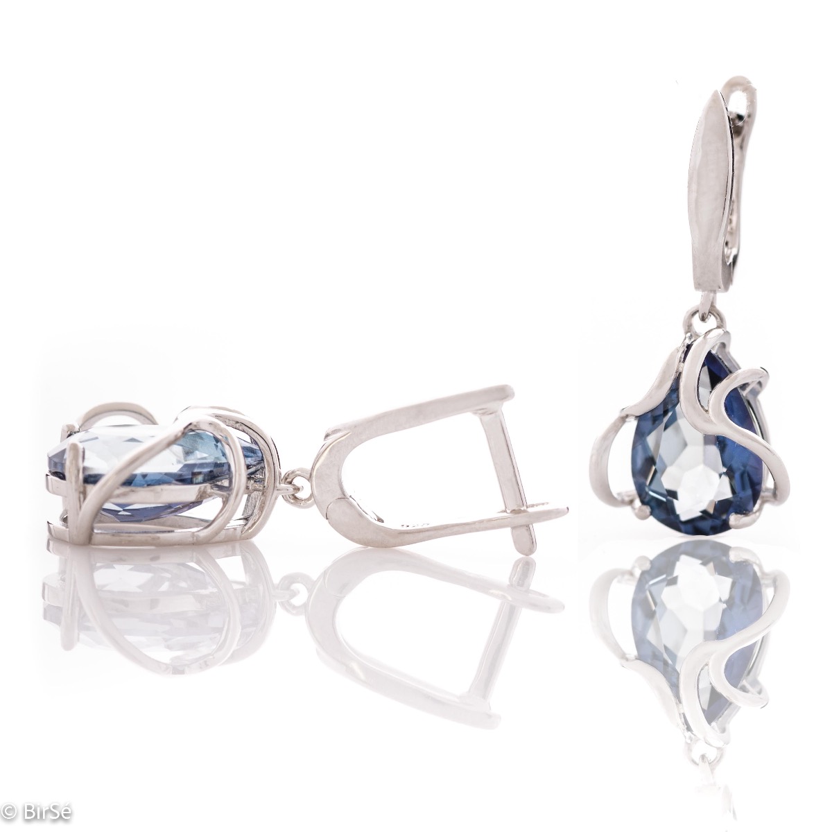 Exquisite earrings with an English clasp and a spectacular combination of soft rhodium silver with a radiant natural blue mystic topaz, enveloped in extraordinary curves.