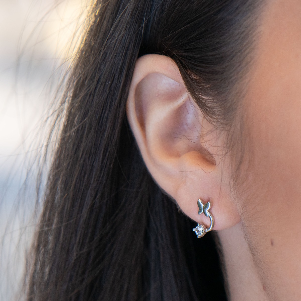 Silver Earrings -,, Butterflies ". Spectacular model of women's earrings made of rhodium silver with a butterfly and zircon. The exquisite design allows for various placement options.