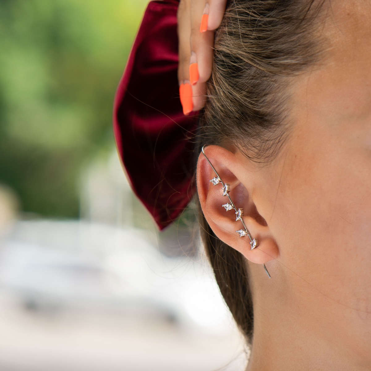 Eccentric women's earrings in fine rhodium silver, with an interesting design layout resembling a branch with leaves of zircons. The earrings are a hairpin type, with a piercing attachment. Extremely sexy style, a suitable gift for girls and women, fans o