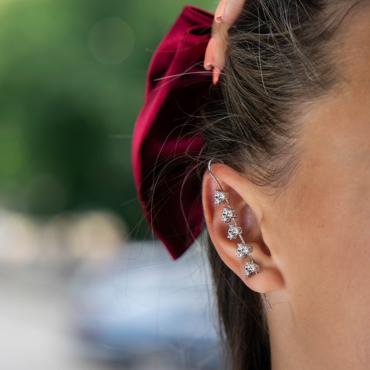 Eccentric women's earrings "Amazing" made of fine rhodium silver, with an interesting design layout, resembling a branch with leaves of zircons. The earrings are hairpin type, with piercing fastening. Extremely sexy style, suitable gift for girls and wome