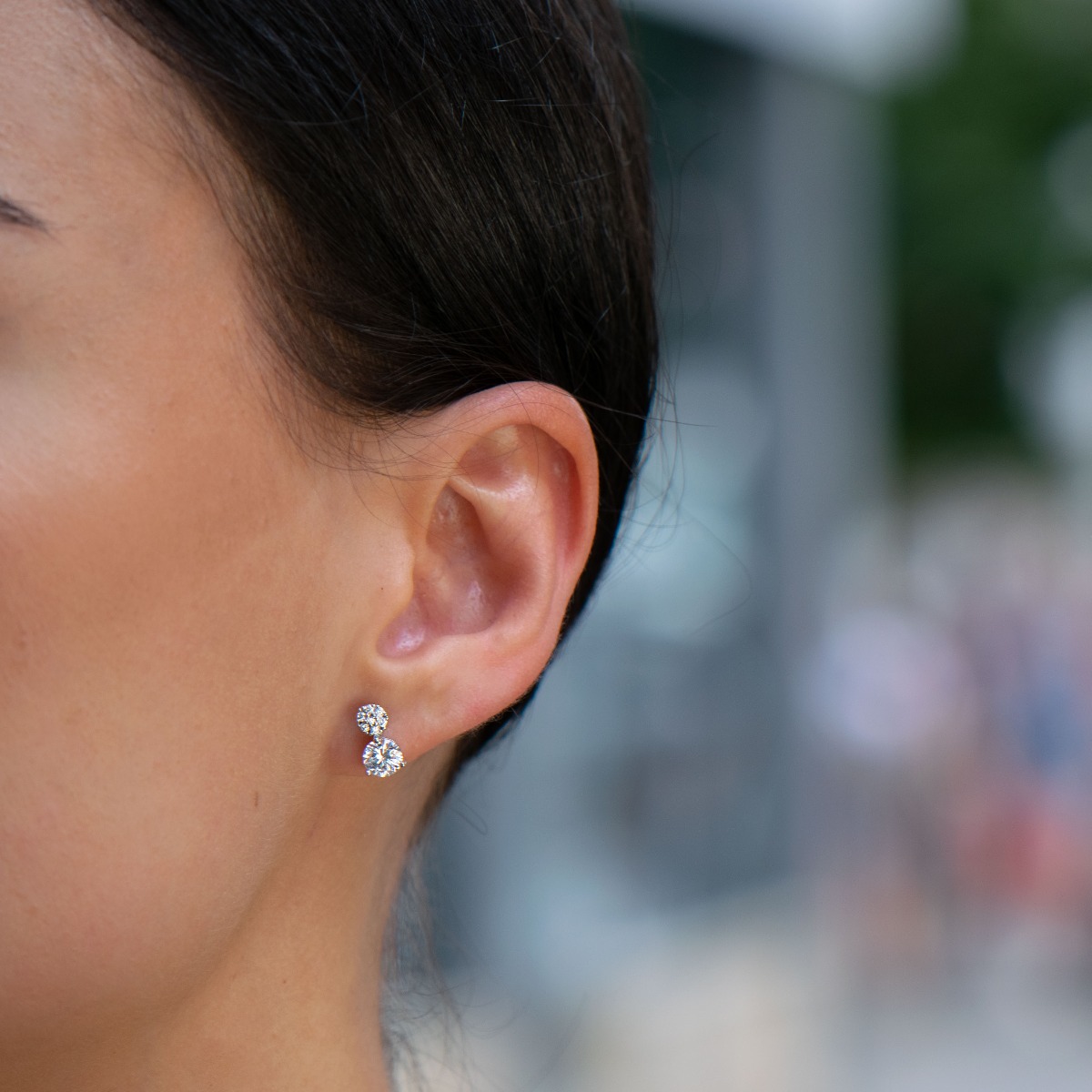 Feminine and tempting earrings cast from rhodium silver with captivating zircons adorning the spectacular jewel. The look of the delicate earrings has a stylish design solution. The fastening is with a pin, for greater convenience and comfort.