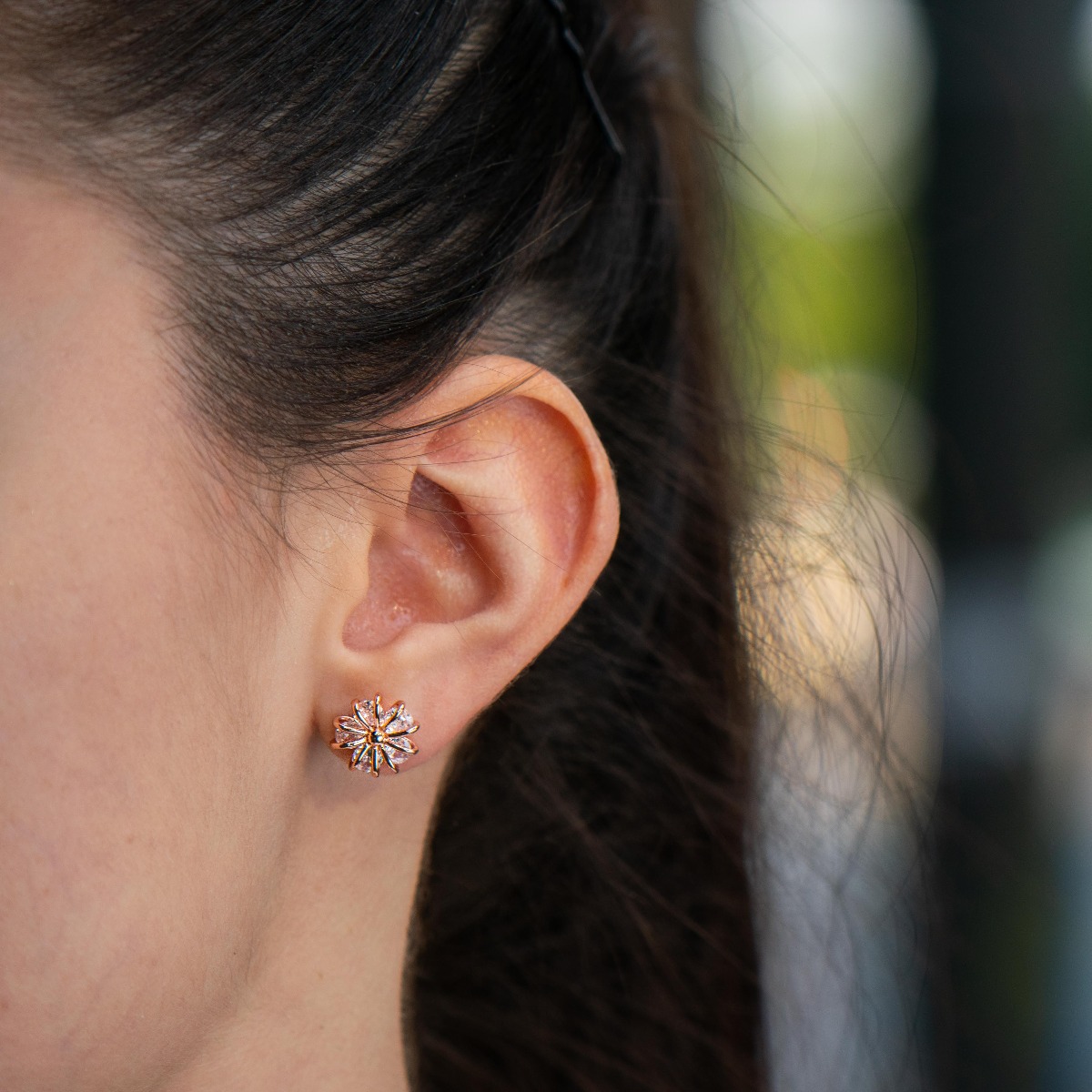 Enchanting Flowers Silver Earrings - an exquisite piece of jewelry made entirely of fine, sparkling silver. Five dazzling zircons are elegantly caught by rose silver strands forming a flower. The earrings have a comfortable pin fastening and are suitable 