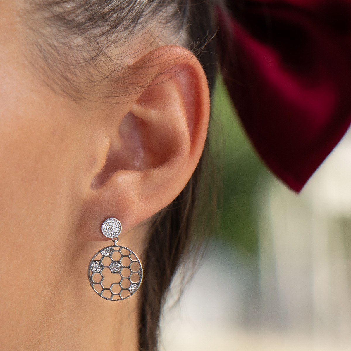 A stylish model of women's dangling earrings, with an elegant design, completely formed by combining rhodium-plated silver with sparkling zircons. The fastening is with a pin - comfortable and practical. A beautiful jewel for your collection of BirSe earr