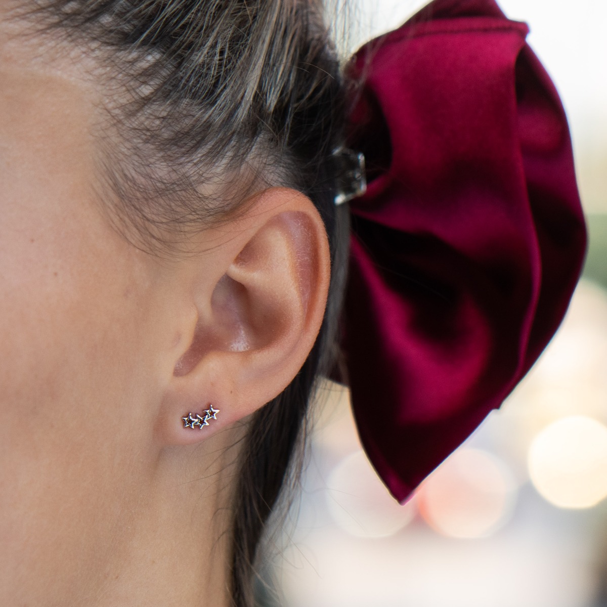 Elegant women's earrings with a star design, made entirely of soft rhodium silver, with a pin fastening that is convenient for your everyday life. A suitable gift for children or ladies.