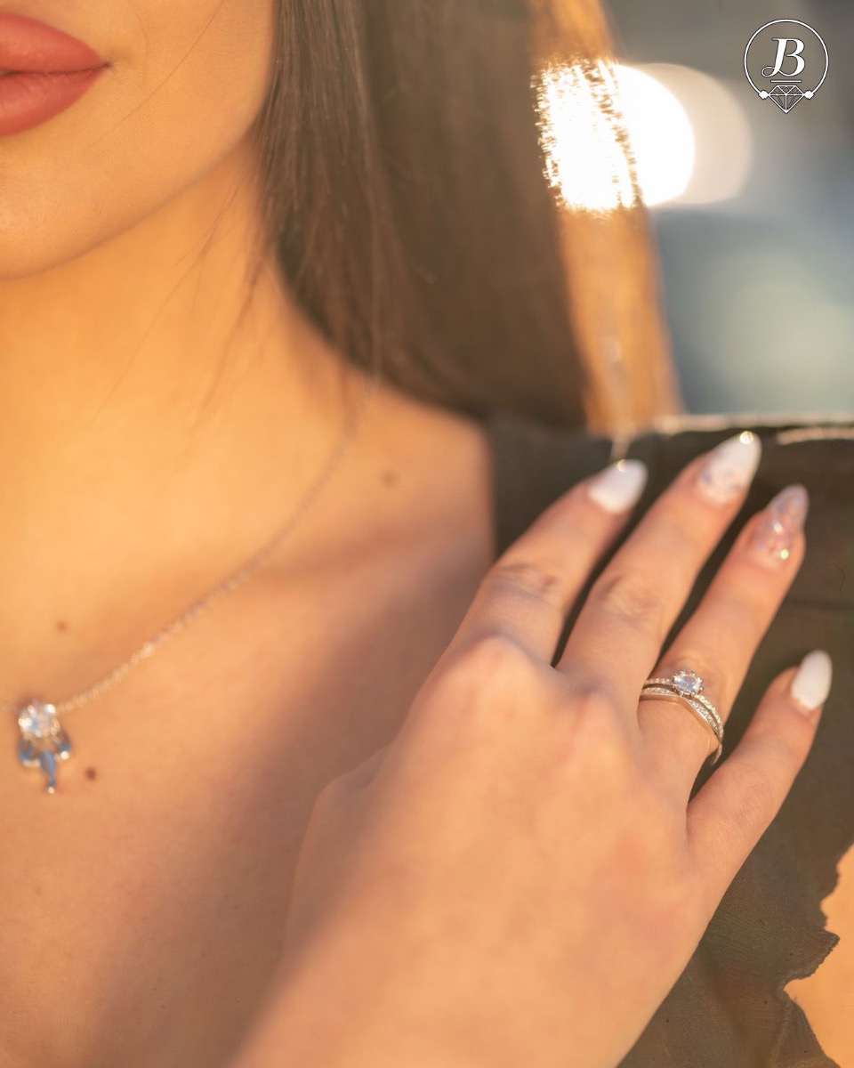 Stylish and elegant women's ring with a scorchingly delicate look. Extremely delicate craftsmanship from a fine combination of refined rhodium silver with sparkling zircon stones.