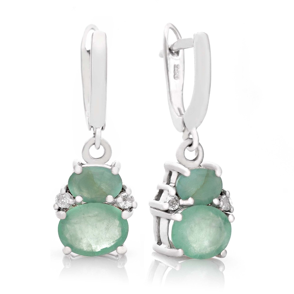 Elegantly crafted rhodium silver earrings for women with a dangling pattern and a comfortable English clasp. Exquisite emeralds in combination with glittering zircons turn the earrings into a charming piece of jewelry, which together with a ring and penda