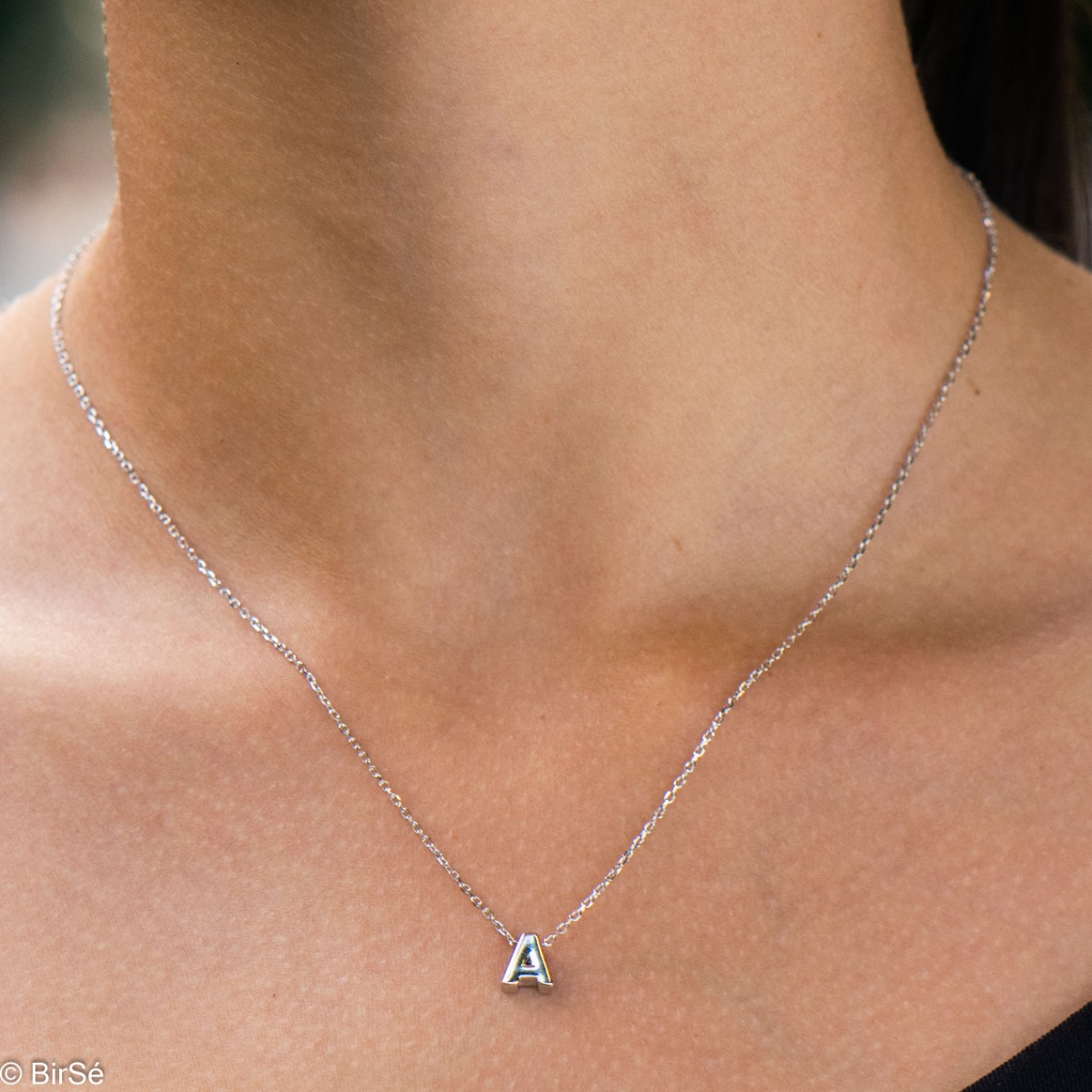 Finely crafted women's sterling silver necklace with the letter A. A delicate and spectacular piece of jewelry, simple and cleverly combined with any kind of rhodium silver jewelry.